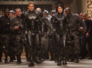 Charlie Hunnam, Rinko Kikuchi, and Mako Mori in "Pacific Rim."  Photo by Kerry Hayes – © 2013 Warner Bros. Entertainment Inc. and Legendary Pictures Funding, LLC.
