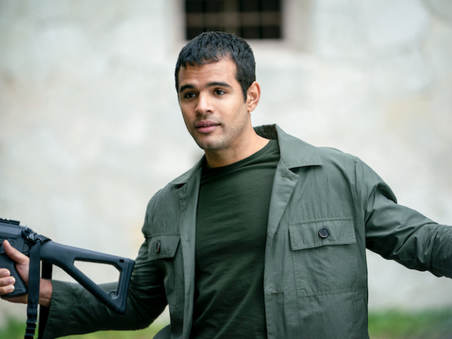 Jacob Scipio (“Carlos”) protects the Spanish Fortress in <em>The Unbearable Weight of Massive Talent</em>. Photo Credit: Katalin Vermes/Lionsgate. The Unbearable Weight of Massive Talent