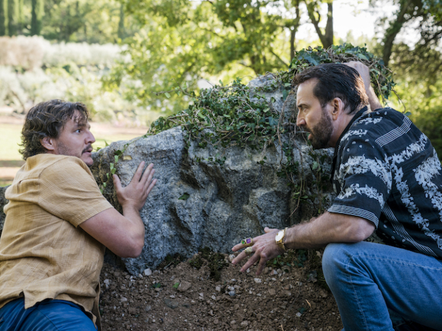 Pedro Pascal (“Javi”, left) and Nicolas Cage (“Nick Cage”, right) strategize making a run for it in <em>The Unbearable Weight of Massive Talent</em>. Photo Credit: Katalin Vermes/Lionsgate. The Unbearable Weight of Massive Talent