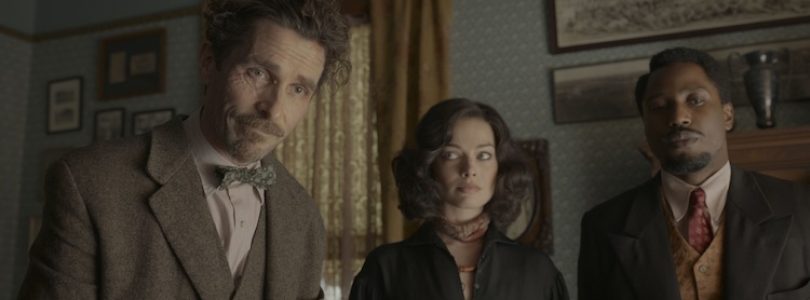 Christian Bale, John David Washington, and Margot Robbie in "Amsterdam"