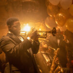 Jovan Adepo plays Sidney Palmer in BABYLON from Paramount Pictures. Photo credit: Scott Garfield.
