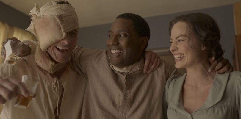 Christian Bale, John David Washington, and Margot Robbie in "Amsterdam"