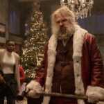 Alexis Louder as Linda and David Harbour as Santa Claus in "Violent Night"