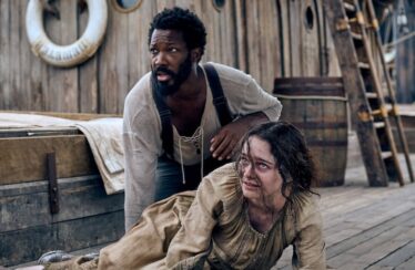 (From left) Clemens (Corey Hawkins) and Anna (Aisling Franciosi) in "The Last Voyage of the Demeter."