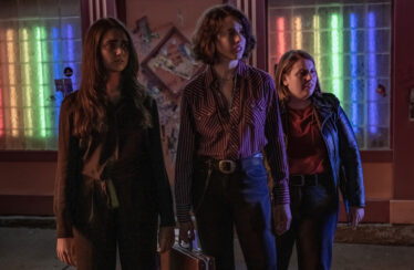Geraldine Viswanathan (l-r), Margaret Qualley, and Beanie Feldstein in director Ethan Coen's "Drive-Away Dolls."
