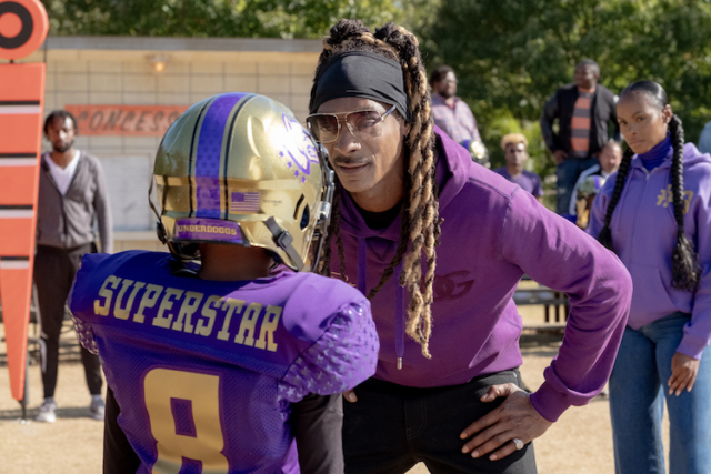 THE UNDERDOGGS (2024) Snoop Dogg and Tika Sumpter in "The Underdoggs." Photo by Wilford Harewood/Wilford Harewood - © 2024 METRO-GOLDWYN-MAYER PICTURES INC. All Rights Reserved.