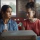 Geraldine Viswanathan and Margaret Qualley in "Drive-Away Dolls."