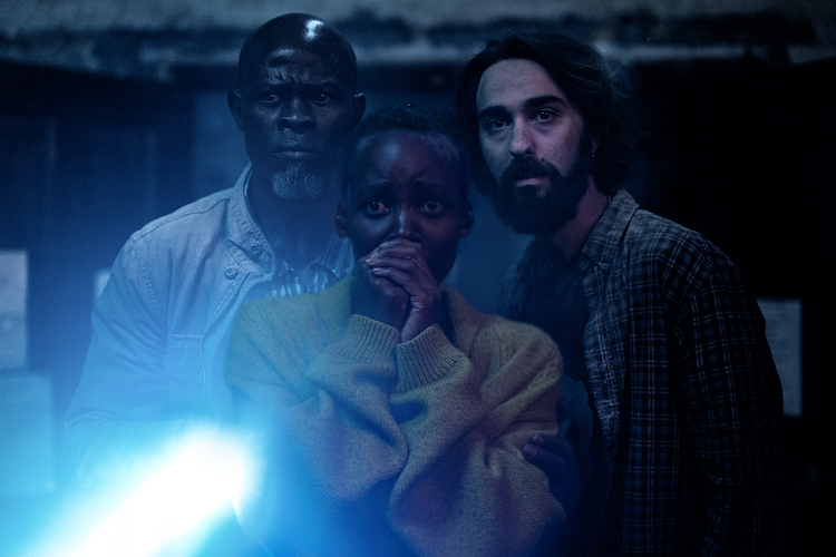 Djimon Hounsou, Lupita Nyong'o, and Alex Wolff in "A Quiet Place: Day One" from Paramount Pictures.