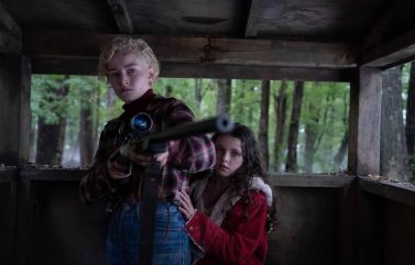 Matilda Firth and Julia Garner in “Wolf Man.”