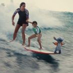 Stitch, Maia Kealoha, Nani, and Sydney Agudong in “Lilo & Stitch.”