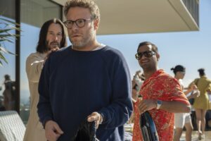 Keanu Reeves as Gabriel, Seth Rogen as Jeff, and Aziz Ansari as Ari in “Good Fortune.”