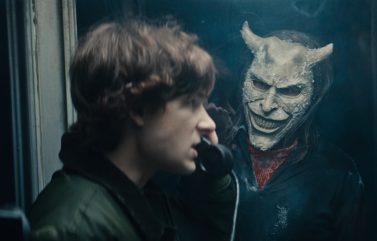 Finn (Mason Thames) and The Grabber (Ethan Hawke) in “Black Phone 2,” written and directed by Scott Derrickson.