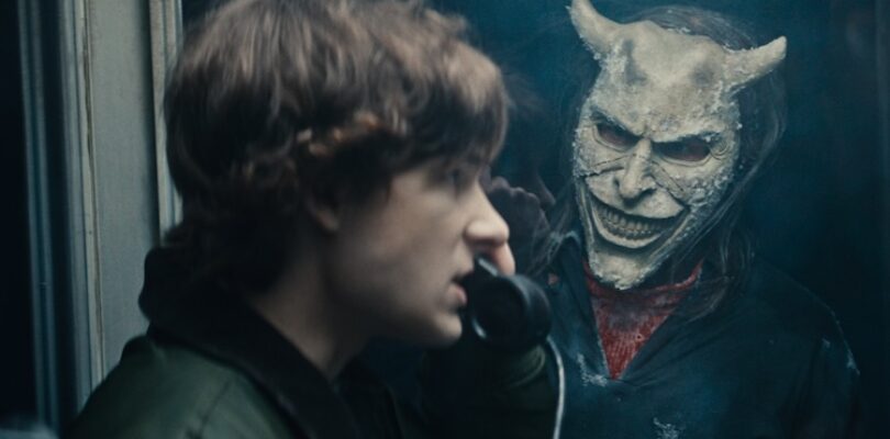 Finn (Mason Thames) and The Grabber (Ethan Hawke) in “Black Phone 2,” written and directed by Scott Derrickson.