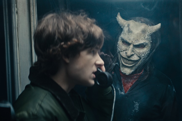 Finn (Mason Thames) and The Grabber (Ethan Hawke) in “Black Phone 2,” written and directed by Scott Derrickson.