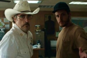 Joaquin Phoenix and Luke Grimes in “Eddington.”