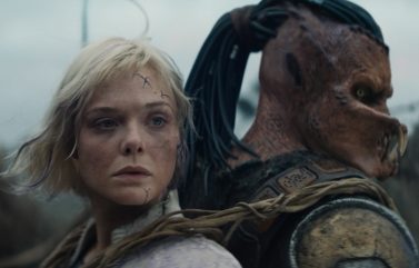Dimitrius Schuster-Koloamatangi and Elle Fanning in “Predator: Badlands.”