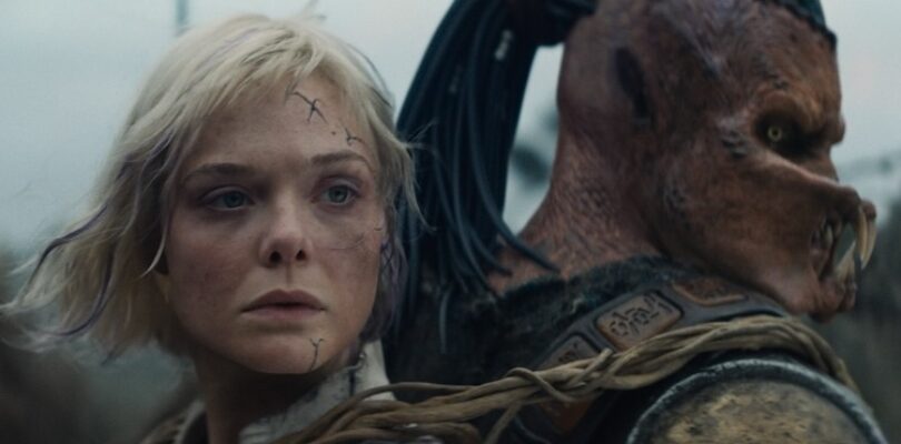 Dimitrius Schuster-Koloamatangi and Elle Fanning in “Predator: Badlands.”